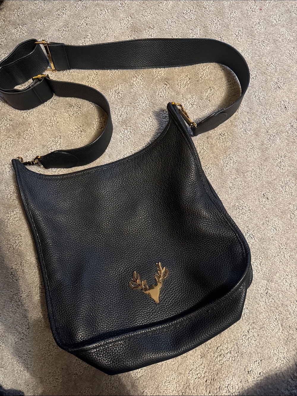 Taxidermy sayer sling Black Pebbled Leather Crossbody with Gold Stag Accent